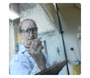 Researcher applying her formulas