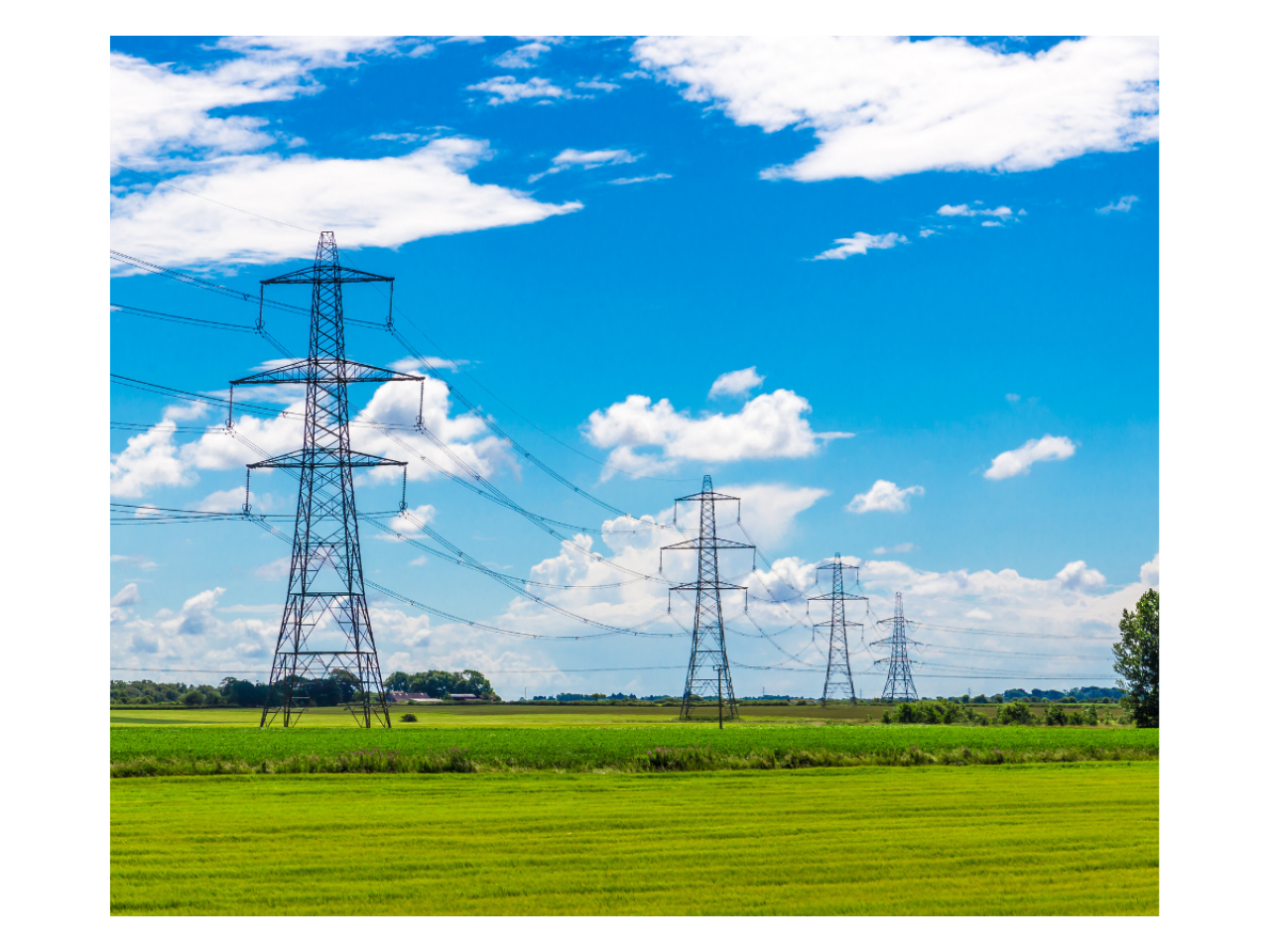 A country view of transmission power towers in a row