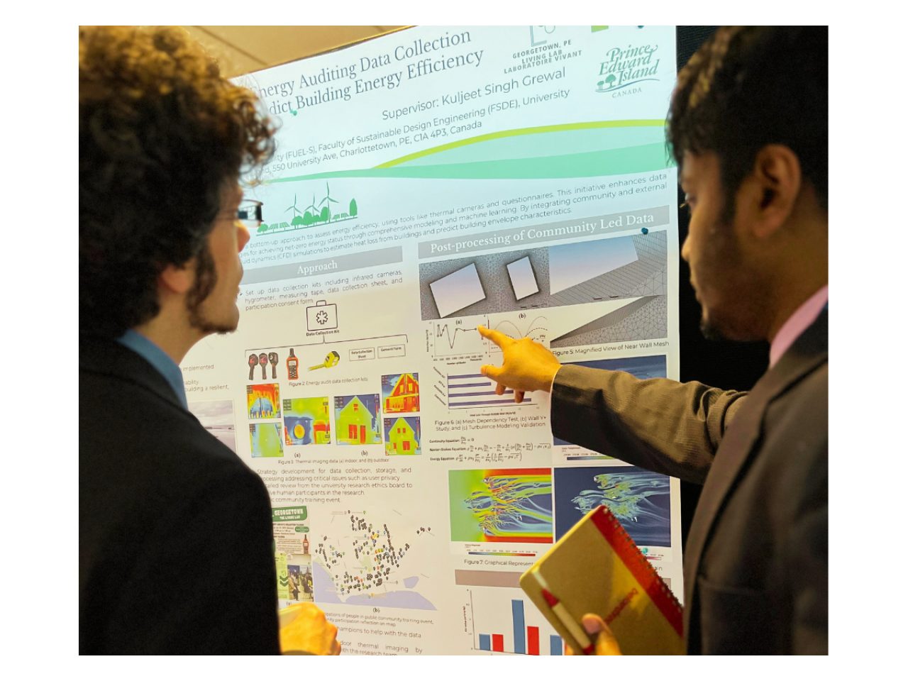 Atlantic Canadian researchers discussing a student poster