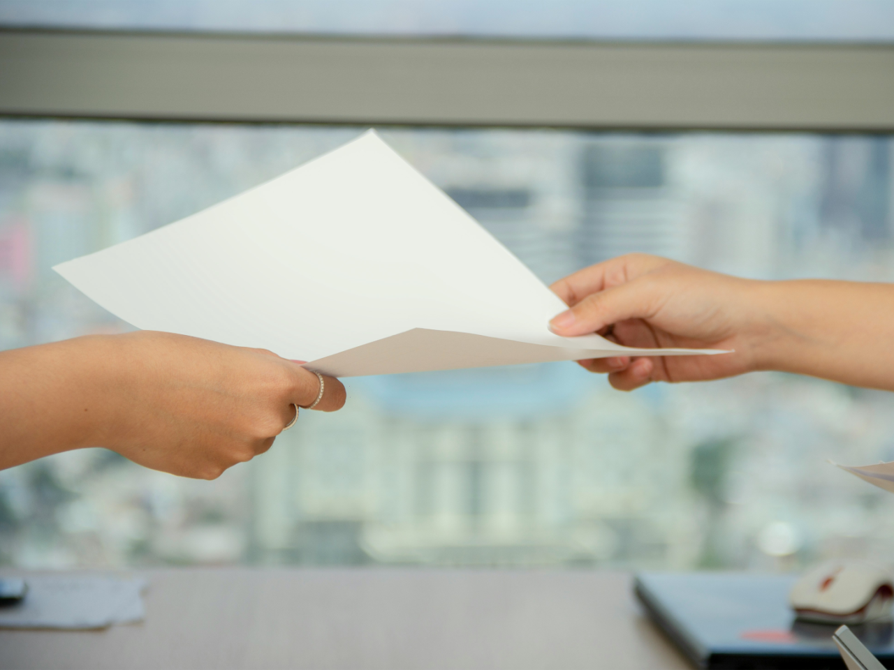 Paper being exchanged